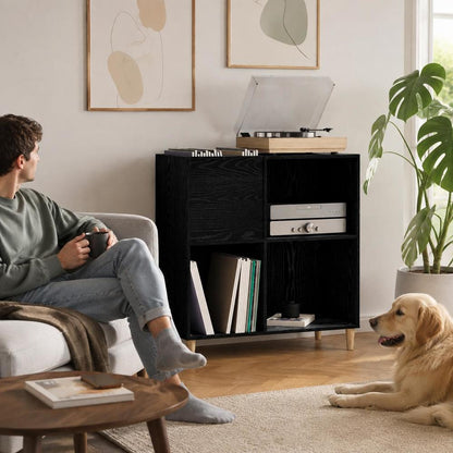 Meuble vinyle noir avec platine dans un coin d’écoute
