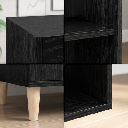 Détails de la finition noire veinée et des pieds du meuble
